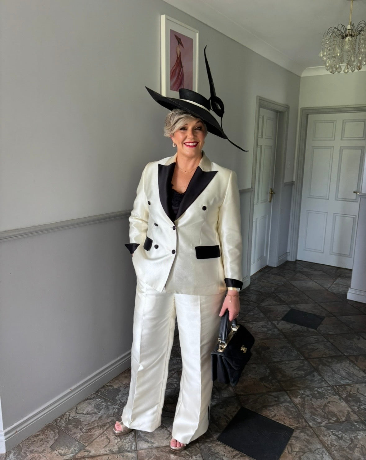 Cream and black suit sample size 16